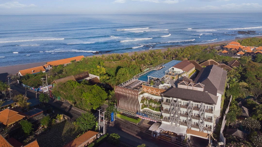 Aerial view of the Canggu coastline and beachfront hotels