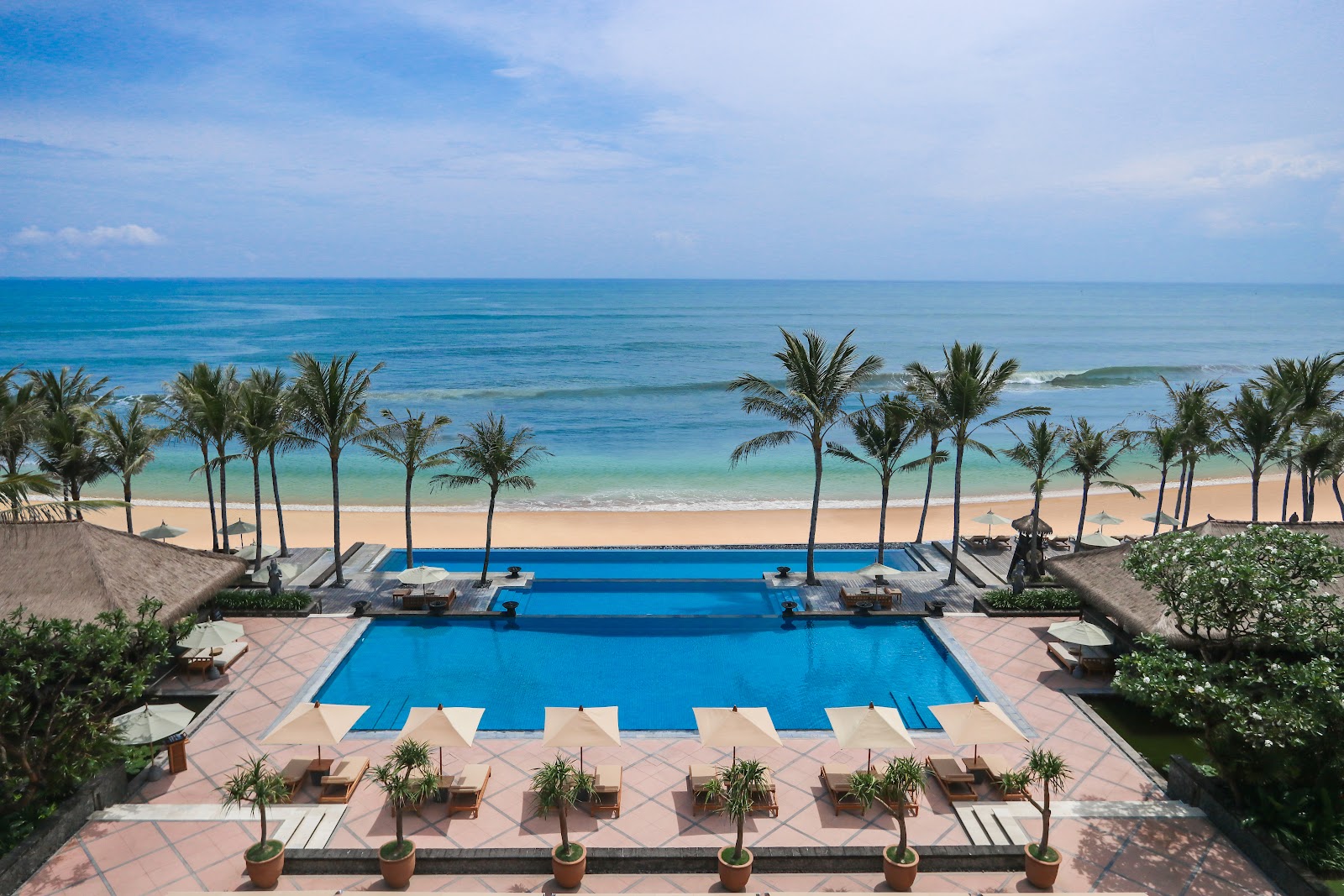 Beachfront pool and ocean views at The Legian Seminyak