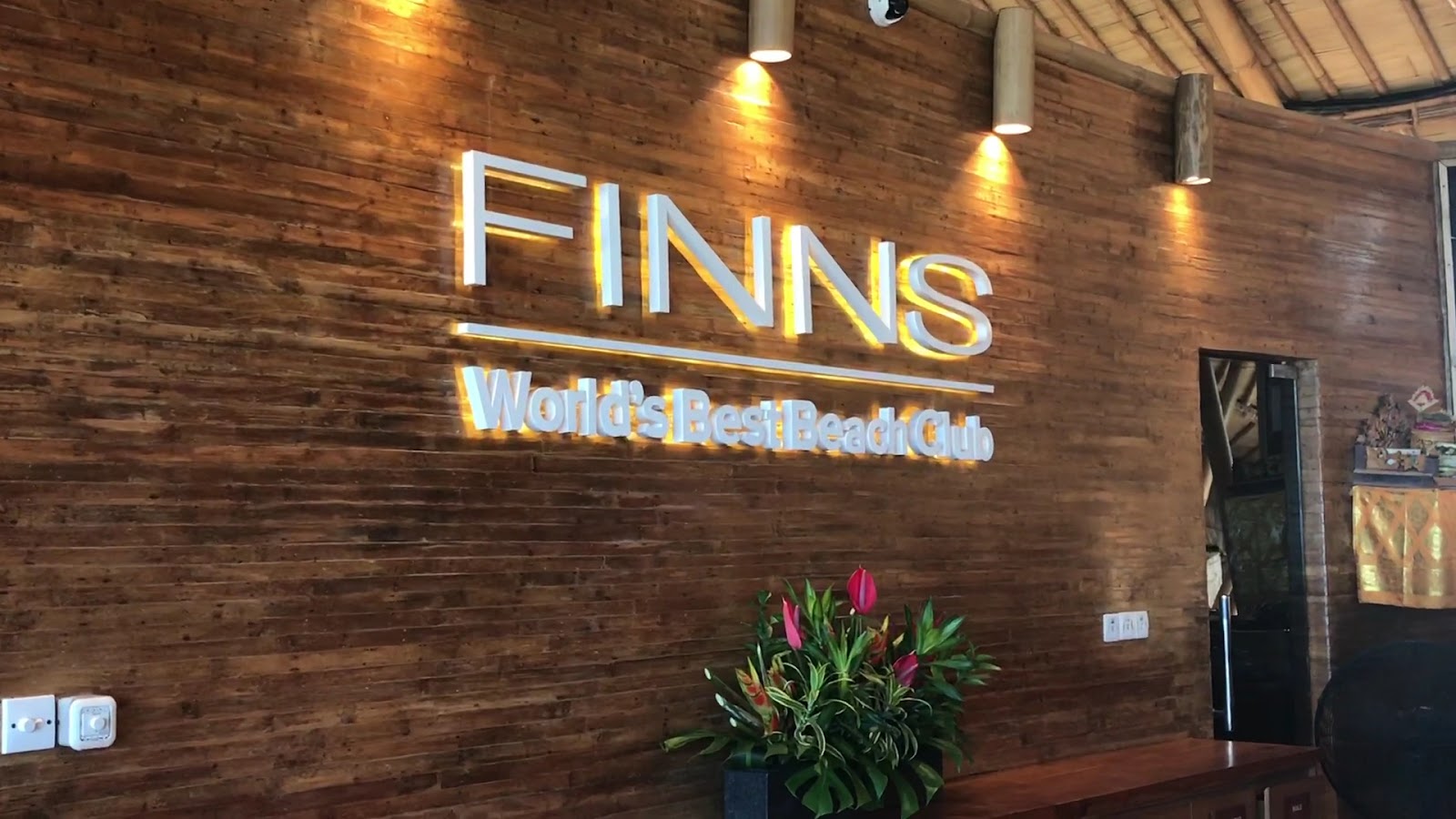 FINNS logo wall at FINNS Beach Club in Berawa
