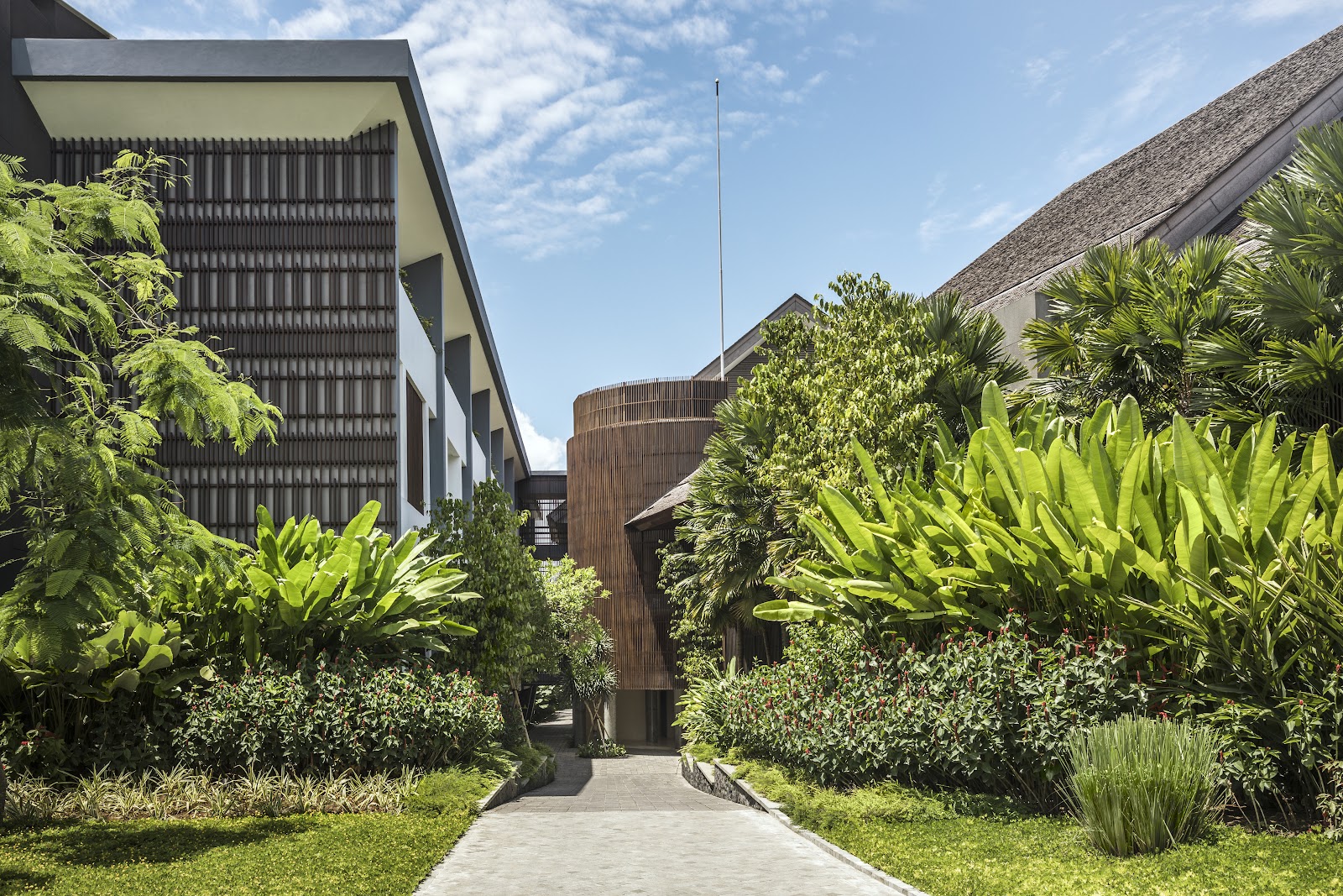 Garden path and resort buildings at COMO Canggu