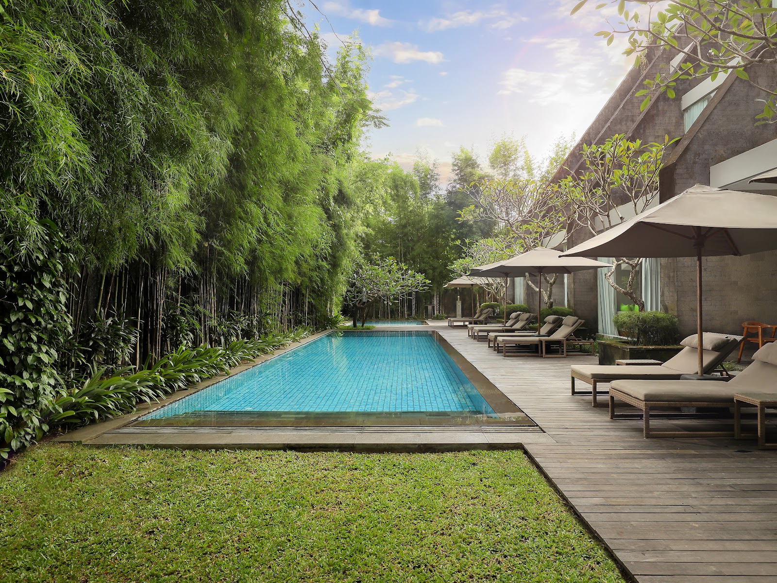 Garden pool and lawn at Maya Sanur Resort and Spa