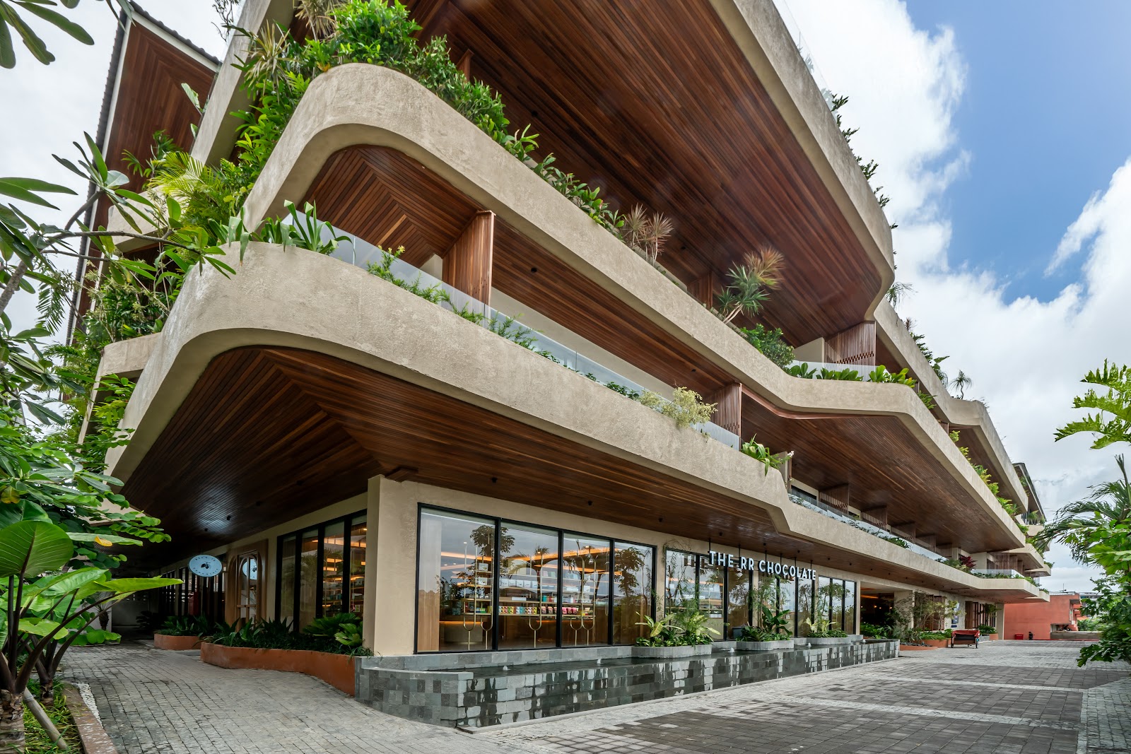 Modern hotel building with greenery at TUI BLUE Berawa Hotel and Villas