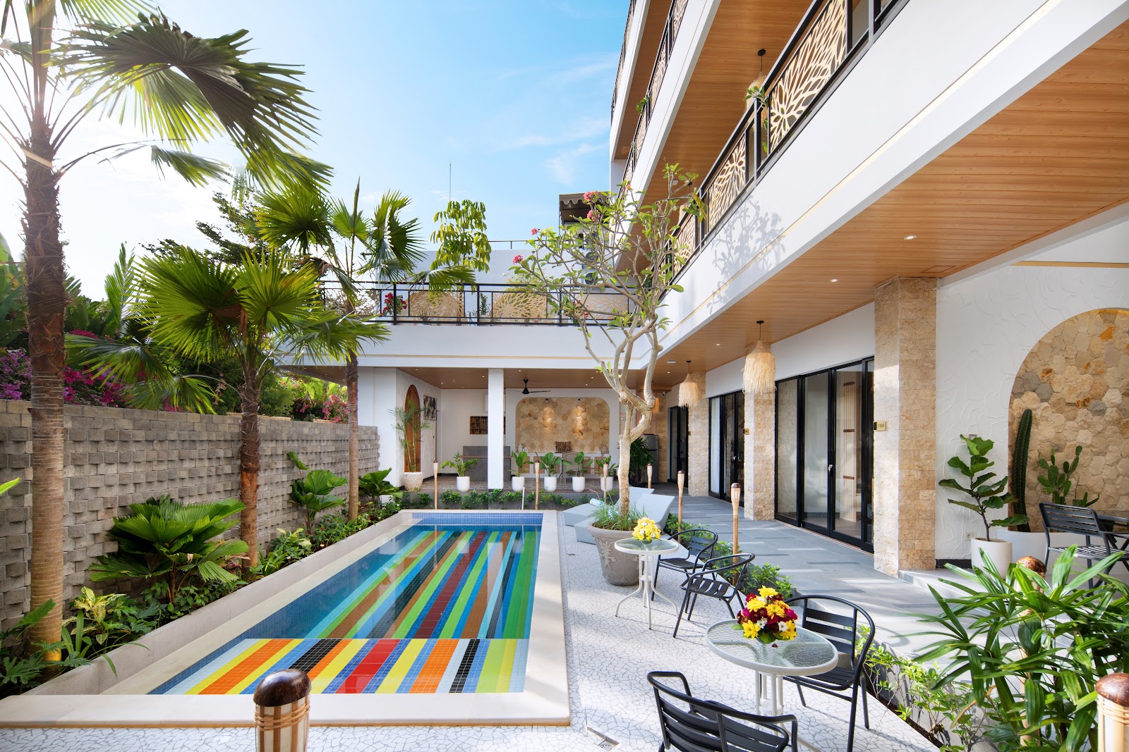 Swimming pool between modern villas at Amandaya Canggu